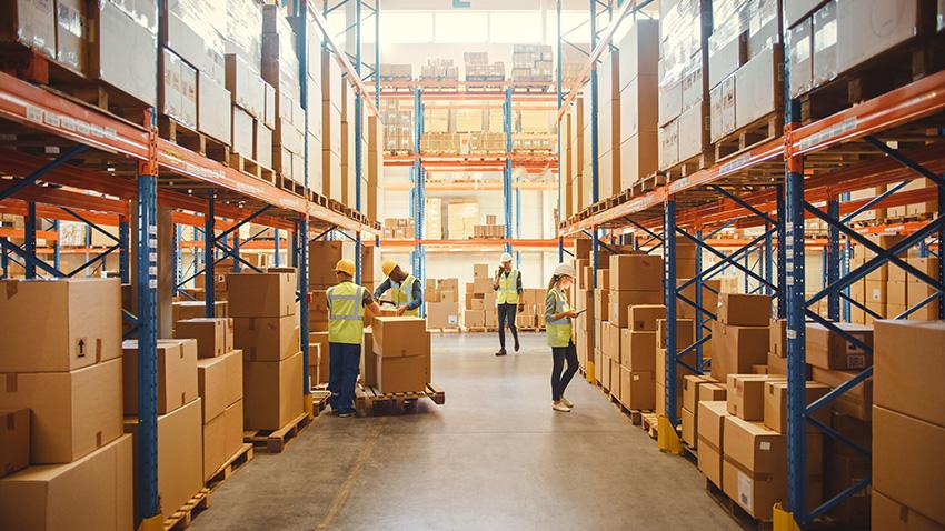 Ground floor shipping workers in warehouse